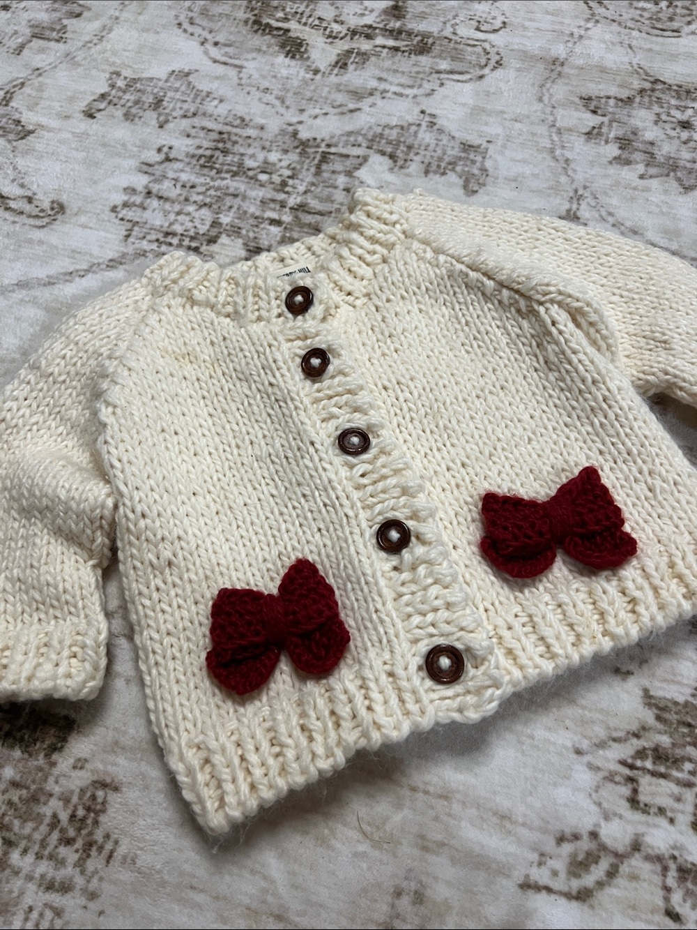 THE BLUEBERRY HILL kid's cozy knit cardigan with bow in cream/red
